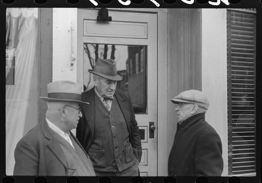 Men outside of a beer parlor in Jewett City, Connecticut