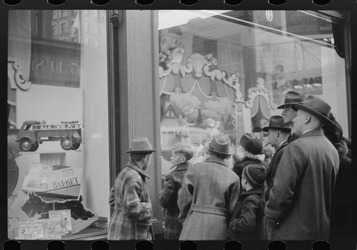 Untitled photo, possibly related to: Window shoppers watching toy display in downtown Providence, Rhode Island