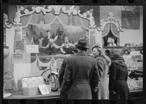 Untitled photo, possibly related to: Window shoppers watching toy display in downtown Providence, Rhode Island