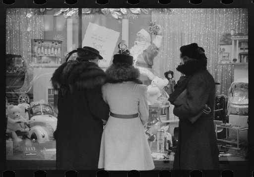 Untitled photo, possibly related to: Window shoppers watching toy display in downtown Providence, Rhode Island
