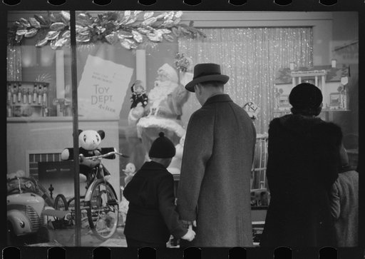 Window shoppers watching toy display in downtown Providence, Rhode Island
