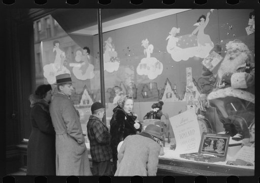 Window shoppers watching toy display in downtown Providence, Rhode Island