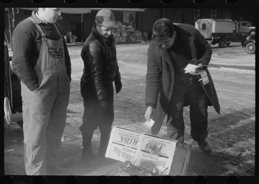 Untitled photo, possibly related to: Farmer at the Governor Dyer market keeping warm around a fire, Providence, Rhode Island