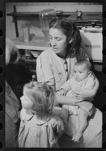 Untitled photo, possibly related to: Wife and children of Dennis Decosta, Portuguese FSA (Farm Security Administration) client, owns twelve cows on a small farm in Little Compton, Rhode Island