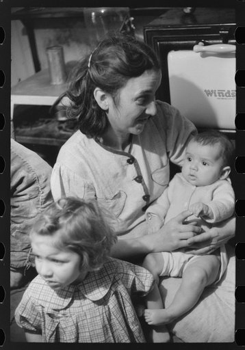 Untitled photo, possibly related to: Wife and children of Dennis Decosta, Portuguese FSA (Farm Security Administration) client, owns twelve cows on a small farm in Little Compton, Rhode Island