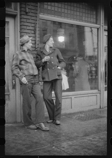 Steel workers waiting for a bus in Aliquippa, Pennsylvania