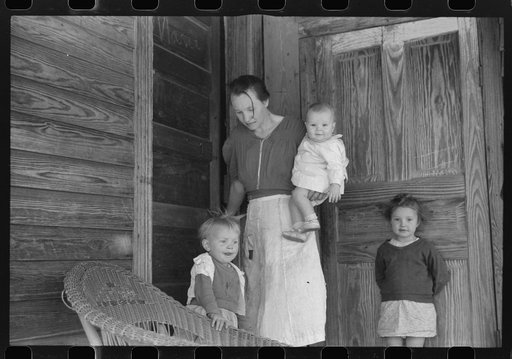 Untitled photo, possibly related to: Tenant family who lived in the Camp Croft area and had to move out. The man was employed working for a neighboring fam and would lose his job when he moved. Near Pacolet, South Carolina