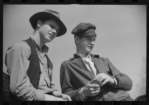 Boys living in the Camp Croft area waiting for the truck to come and move their families out near Whitestone, South Carolina