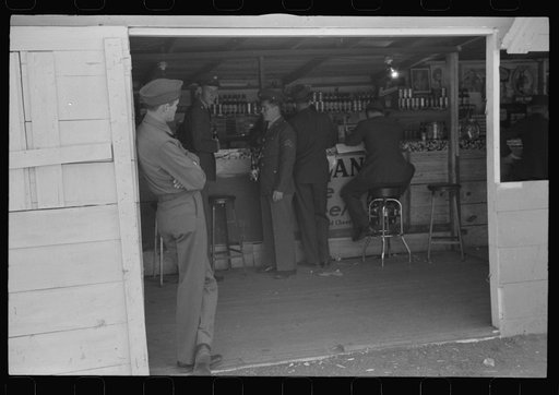 Untitled photo, possibly related to: At a beer joint and entertainment hall recently put up just outside the Camp Stewart grounds. Near Hinesville, Georgia