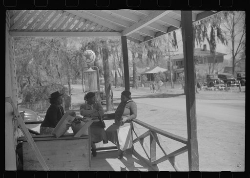 Untitled photo, possibly related to: On the porch of a general store in Hinesville, Georgia