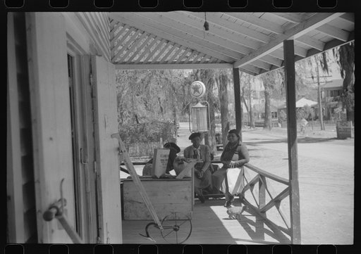 Untitled photo, possibly related to: On the porch of a general store in Hinesville, Georgia