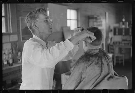 Mr. J.H. Parham, barber and notary public in Centralhatchee, Heard County, Georgia