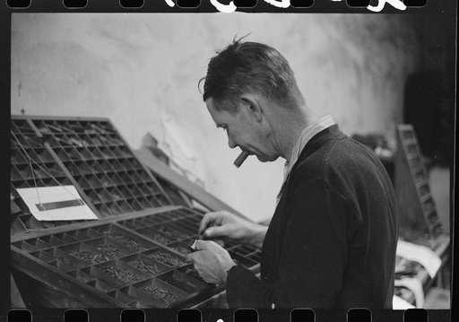 Untitled photo, possibly related to: Setting type in the local newspaper office in Franklin, Heard County, Georgia