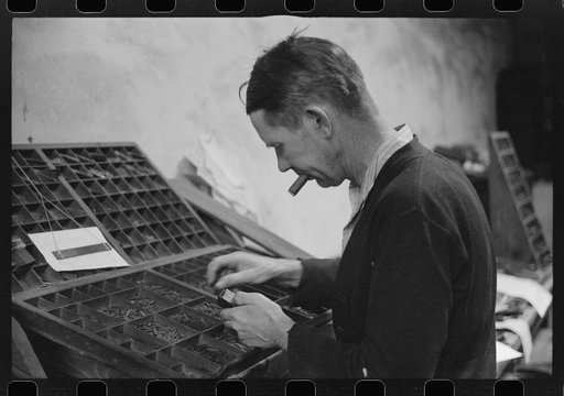 Untitled photo, possibly related to: Setting type in the local newspaper office in Franklin, Heard County, Georgia