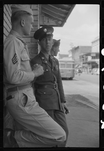 Untitled photo, possibly related to: Soldiers from Fort Benning on a street in Columbus, Georgia