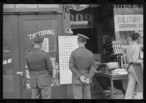 Untitled photo, possibly related to: Window display in military supply store in Columbus, Georgia