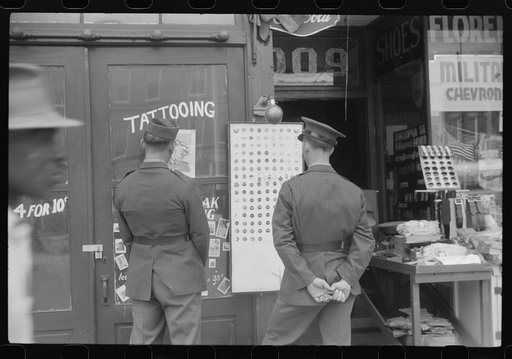 Untitled photo, possibly related to: Window display in military supply store in Columbus, Georgia