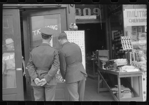 Untitled photo, possibly related to: Window display in military supply store in Columbus, Georgia