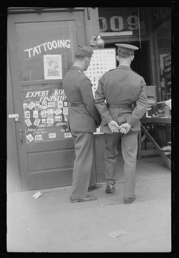 Untitled photo, possibly related to: Soldiers from Fort Benning on a street in Columbus, Georgia