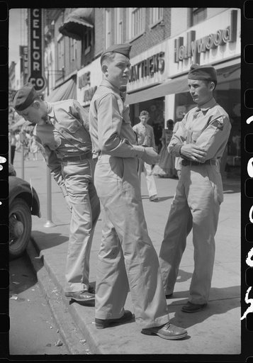 Untitled photo, possibly related to: Soldiers from Fort Benning on a street in Columbus, Georgia