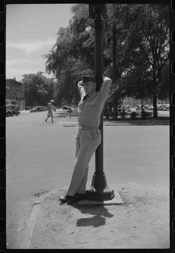 Untitled photo, possibly related to: Soldier from Fort Benning on a street in Columbus, Georgia