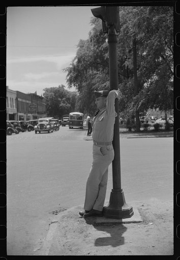 Untitled photo, possibly related to: Soldier from Fort Benning on a street in Columbus, Georgia