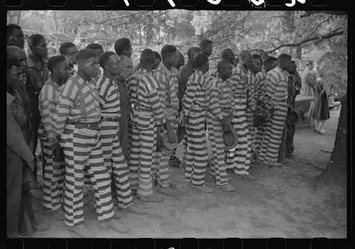 Convicts from the Greene County prison camp at the funeral of their warden who was killed in an automobile accident, Georgia
