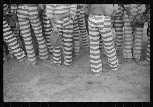 Untitled photo, possibly related to: Convicts from the Greene County prison camp at the funeral of their warden who was killed in an automobile accident, Georgia