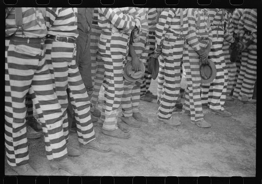 Convicts from the Greene County prison camp at the funeral of their warden who was killed in an automobile accident, Georgia
