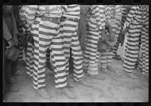 Untitled photo, possibly related to: Convicts from the Greene County prison camp at the funeral of their warden who was killed in an automobile accident, Georgia