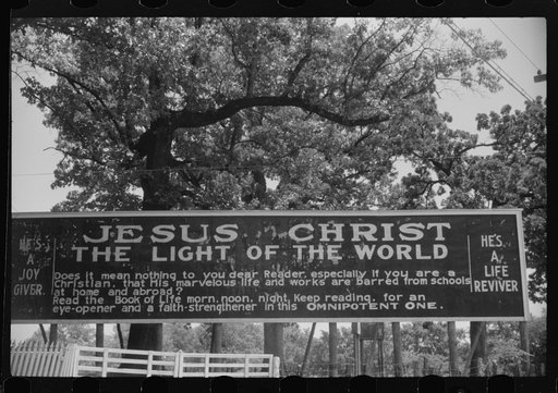 Sign outside a religious arbor in Eutaw, Alabama