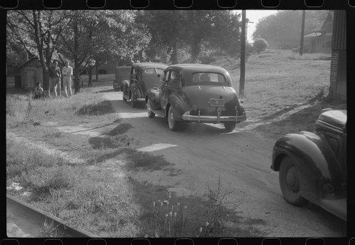 Untitled photo, possibly related to: Mill workers who lived largely in rural areas being taken through CIO picket line at a textile mill in Greensboro, Georgia. The lockout lasting about three months ending in a signed contract