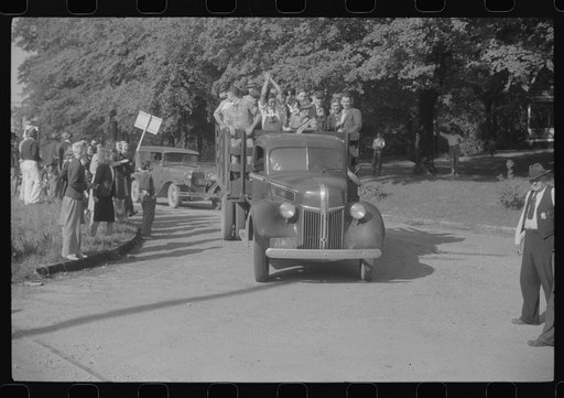 Mill workers who lived largely in rural areas being taken through CIO picket line at a textile mill in Greensboro, Georgia. The lockout lasting about three months ending in a signed contract
