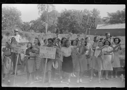 CIO pickets jeering at few workers who were entering a mill in Greensboro, Greene County, Georgia