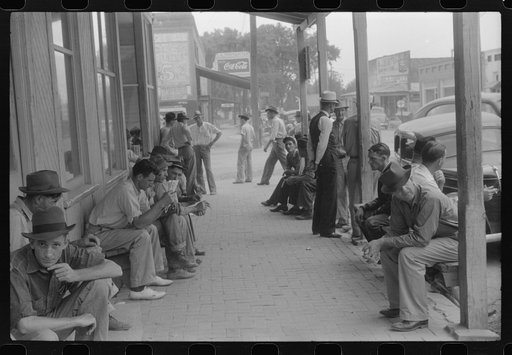 Workers, some of them unemployed, on the main street of Childersburg, Alabama