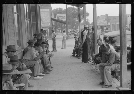 Untitled photo, possibly related to: Workers, some of them unemployed, on the main street of Childersburg, Alabama