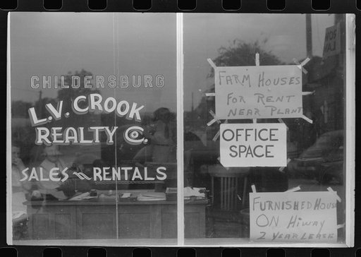 Real estate agent's window, Childersburg, Alabama