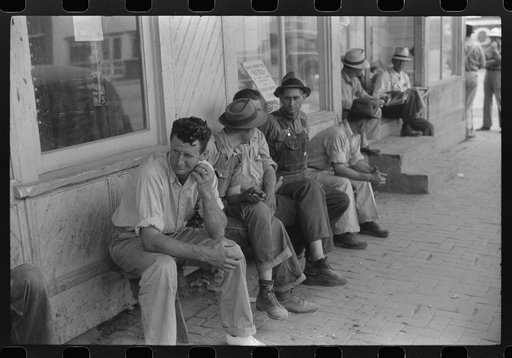 Untitled photo, possibly related to: Workers, some of them unemployed, on the main street of Childersburg, Alabama