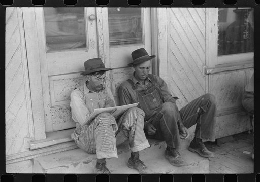 Untitled photo, possibly related to: Workers outside a store on the main street of Childersburg, Alabama