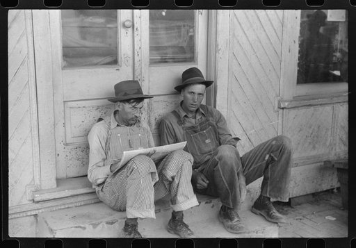 Untitled photo, possibly related to: Workers outside a store on the main street of Childersburg, Alabama