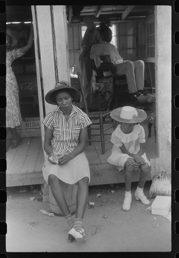 Saturday afternoon outside of a Negro store and barbershop in Union Point, Greene County, Georgia