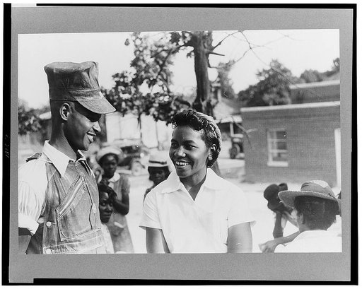 Saturday afternoon outside of a Negro store and barbershop in Union Point, Greene County, Georgia