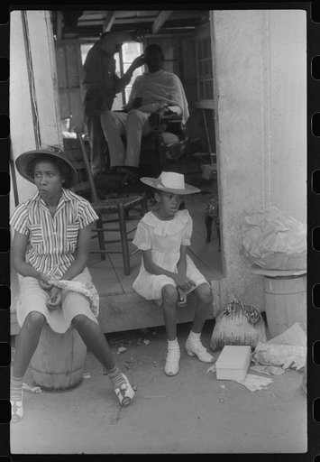 Untitled photo, possibly related to: Saturday afternoon outside of a Negro store and barbershop in Union Point, Greene County, Georgia