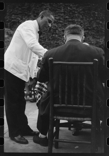 Untitled photo, possibly related to: Waiter in a restaurant in Washington, D.C.