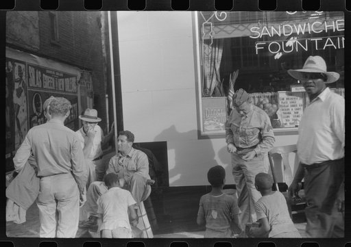 Untitled photo, possibly related to: Soldiers getting their shoes shined in Fredericksburg, Virginia