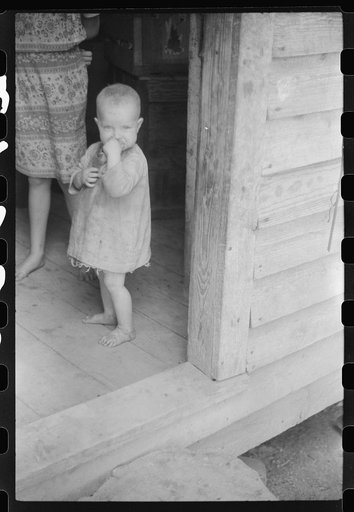 Untitled photo, possibly related to: Youngest child of William Corneal, farmer who must move out of the area being taken over by the army for maneuver grounds in Caroline County, Virginia
