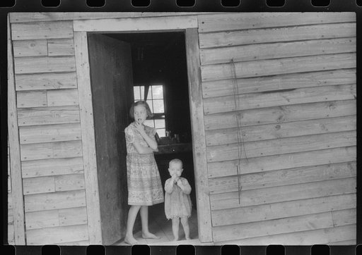 Untitled photo, possibly related to: Children of William Corneal, farmer who must move out of the area being taken over by the army for maneuver grounds in Caroline County, Virginia