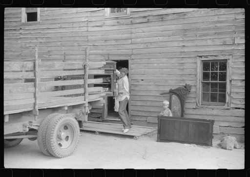 The family of Russell Tombs moving out of their home which is in the area being taken over by the army in Caroline County, Virginia