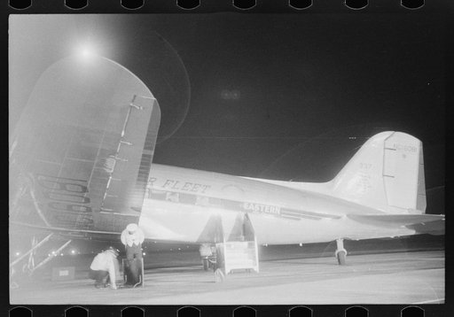 Untitled photo, possibly related to: A plane waiting to take off at the municipal airport, Washington, D.C.