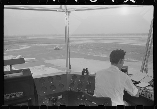 Plane coming in at the municipal airport, seen from the control tower, Washington, D.C.